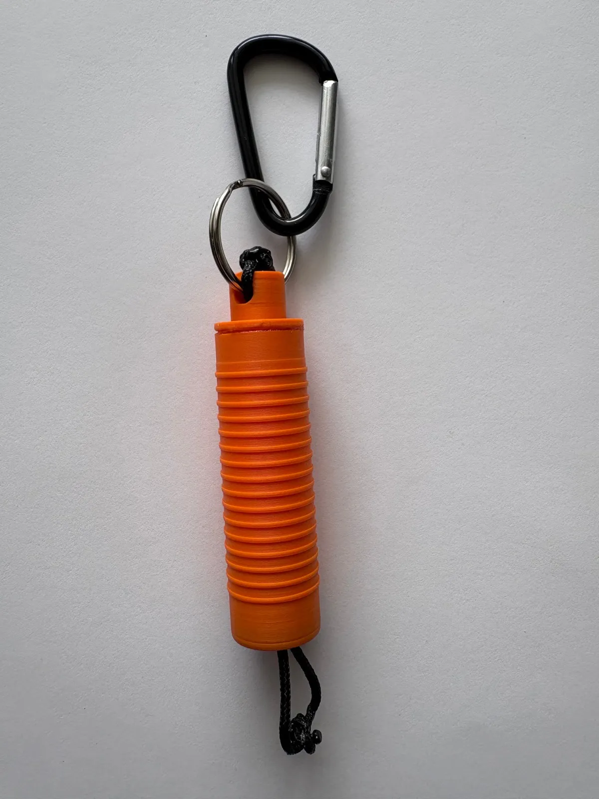 SecuFlag Trainer in a plain orange housing with no lettering